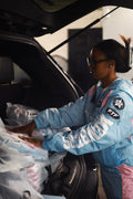 Woman wearing the Family Powder Blue and Pink windbreaker set